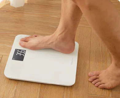 Step on the scale to start weighing